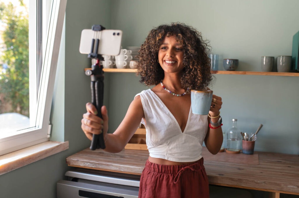 woman recording user-generated content for her mug maker